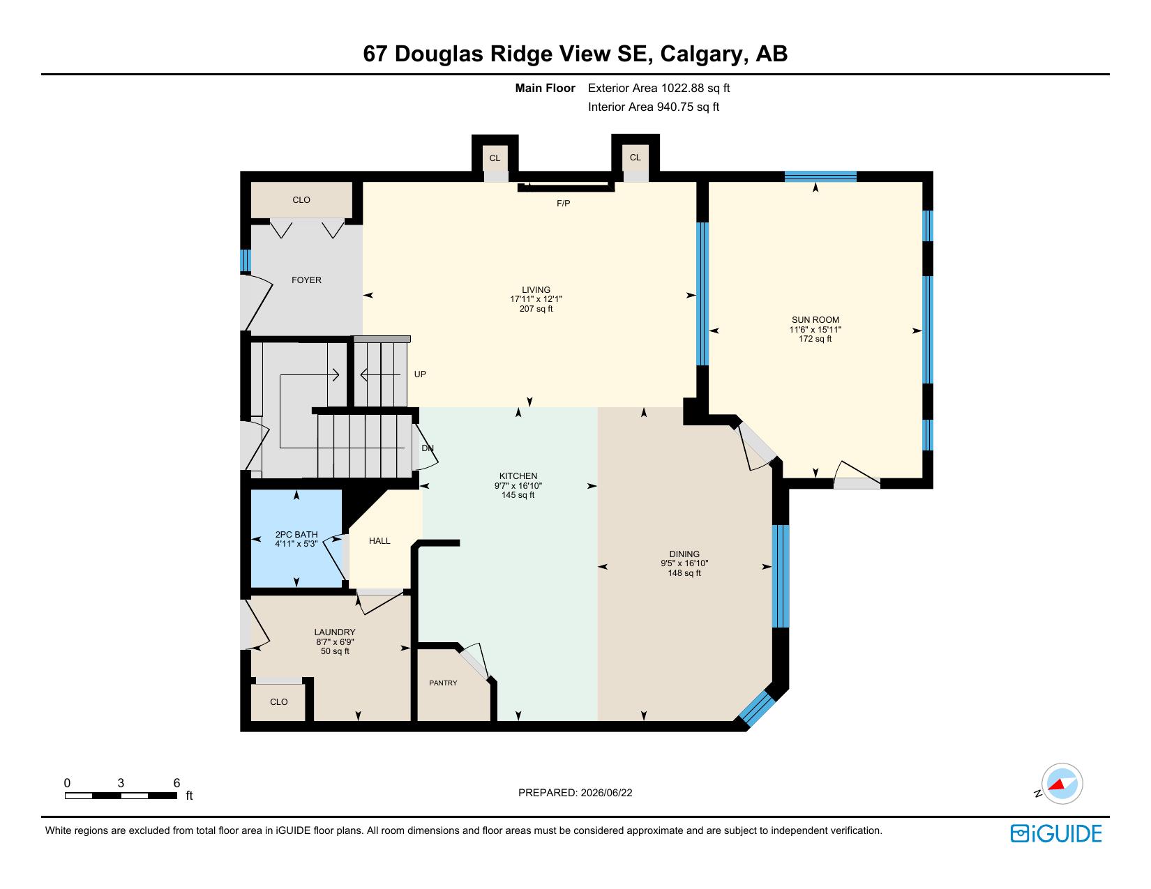 Main floor plan with living, kitchen, dining, sunroom, laundry and 2pc bath